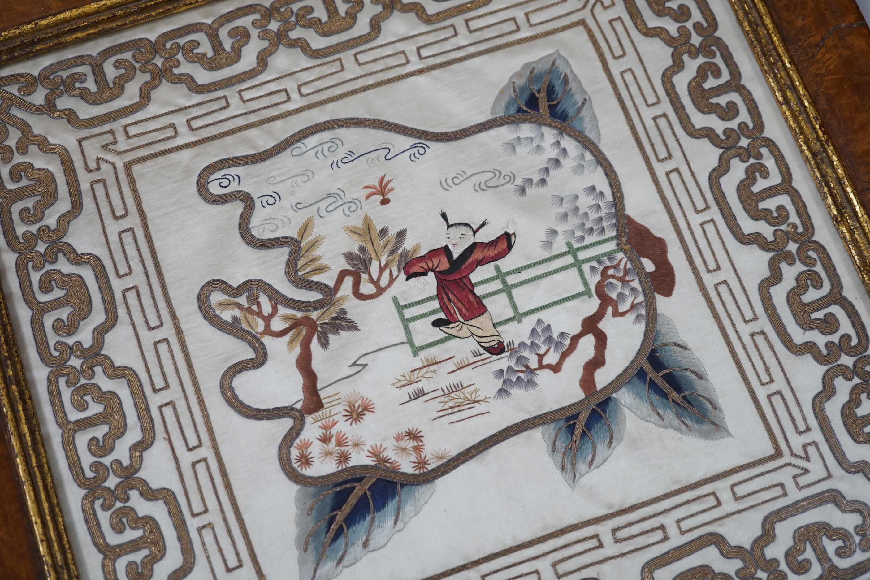 A pair of Chinese silk figurative multicoloured and gold metallic thread silk embroideries in maple frames, 33.5cms square